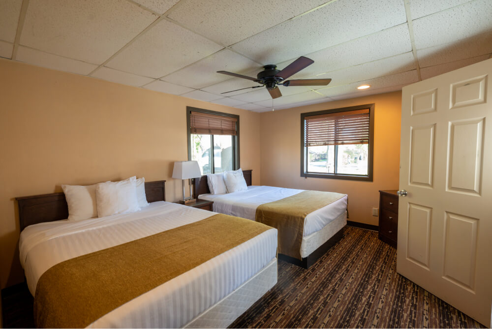 Two Beds with Ceiling Fan
